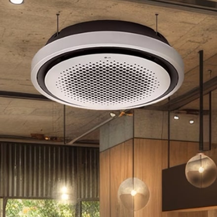 A scene where the LG Round Cassette is installed, harmonizing beautifully with the store lighting.